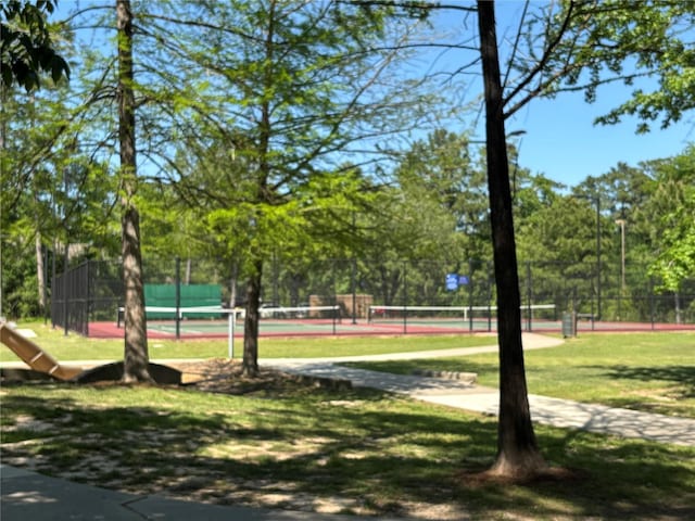 34 Quiet Peace Pl, The Woodlands, TX 77381 - view of tennis court with fence