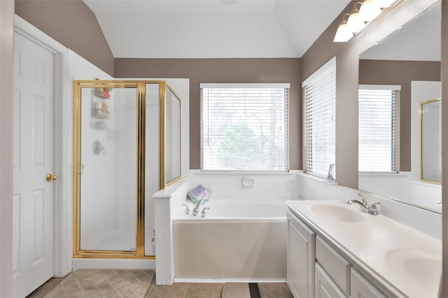 22 Almond Branch Pl, The Woodlands, TX 77382 - bathroom with vaulted ceiling, plenty of natural light, a stall shower, a garden tub, and double vanity