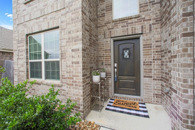 16129 Barge Way, Crosby, TX 77532 - doorway to property featuring brick siding