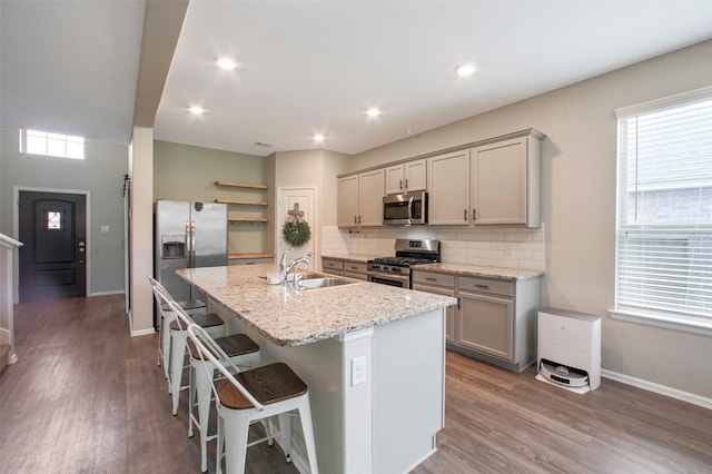 16129 Barge Way, Crosby, TX 77532 - kitchen with appliances with stainless steel finishes, a sink, gray cabinets, and recessed lighting
