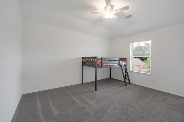 16129 Barge Way, Crosby, TX 77532 - unfurnished bedroom with carpet floors, baseboards, and a ceiling fan