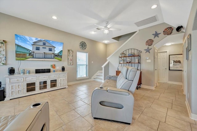 28 Dolphin St, Bayou Vista, TX 77563 - living area with a ceiling fan, stairway, lofted ceiling, arched walkways, and recessed lighting
