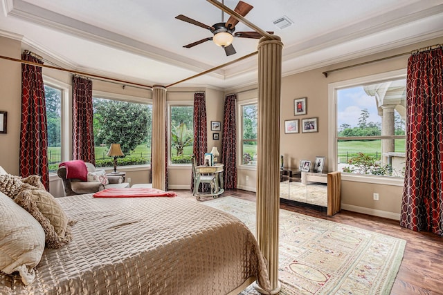 2802 Twin Fountains Dr, Houston, TX 77068 - bedroom featuring ornamental molding, light wood-type flooring, baseboards, a tray ceiling, and ceiling fan