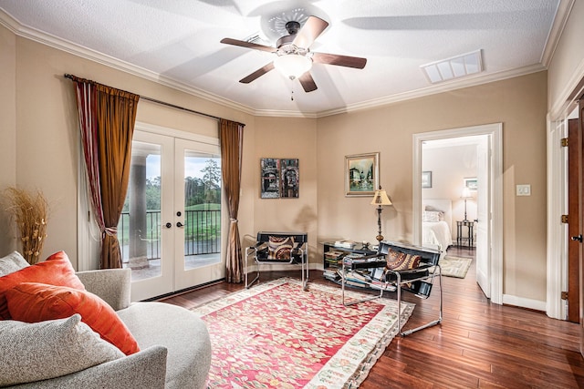 2802 Twin Fountains Dr, Houston, TX 77068 - sitting room featuring french doors, a ceiling fan, hardwood / wood-style floors, baseboards, and crown molding