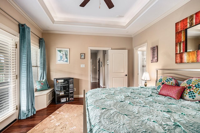 2802 Twin Fountains Dr, Houston, TX 77068 - bedroom featuring a raised ceiling, dark wood-style flooring, crown molding, and ceiling fan