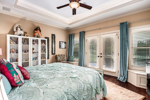 2802 Twin Fountains Dr, Houston, TX 77068 - bedroom featuring access to outside, a raised ceiling, ornamental molding, dark wood finished floors, and multiple windows