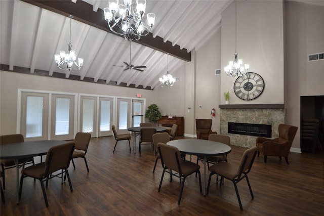 14459 Misty Meadow Ln, Houston, TX 77079 - dining room featuring a chandelier, a premium fireplace, high vaulted ceiling, beamed ceiling, and dark wood-style flooring