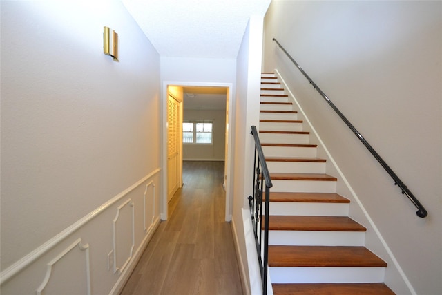 14459 Misty Meadow Ln, Houston, TX 77079 - stairs featuring wood finished floors