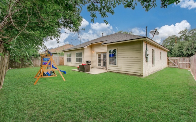 3116 Grassmere St, Houston, TX 77051 - back of house with a patio area, a playground, and a shingled roof