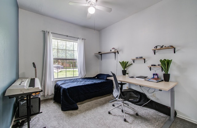 3116 Grassmere St, Houston, TX 77051 - carpeted bedroom with a desk, ceiling fan, and baseboards