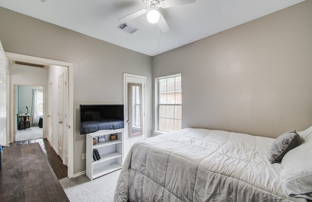 3116 Grassmere St, Houston, TX 77051 - carpeted bedroom featuring multiple windows, baseboards, and a ceiling fan