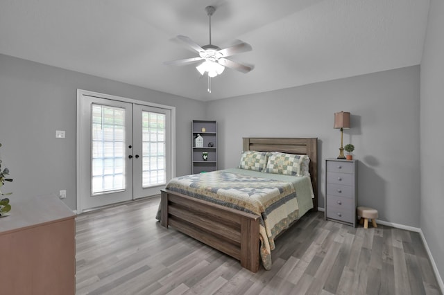 bedroom featuring french doors, access to outside, light wood finished floors, baseboards, and a ceiling fan