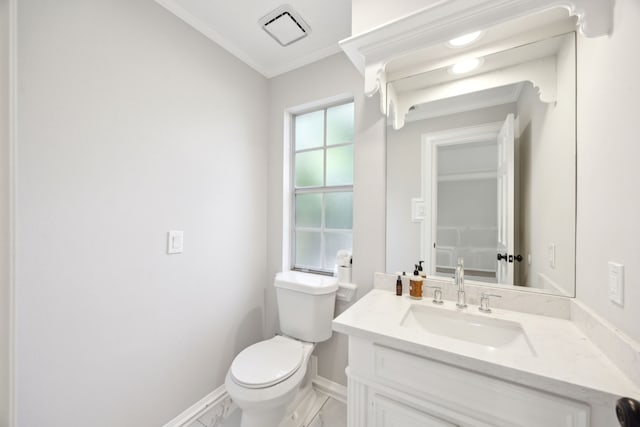 half bathroom with toilet, baseboards, ornamental molding, and vanity