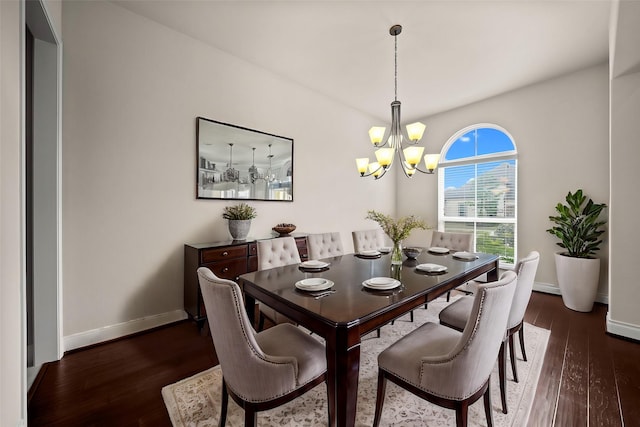 28209 Regal Wood Ct, Spring, TX 77386 - dining room featuring a chandelier, dark wood-type flooring, and baseboards