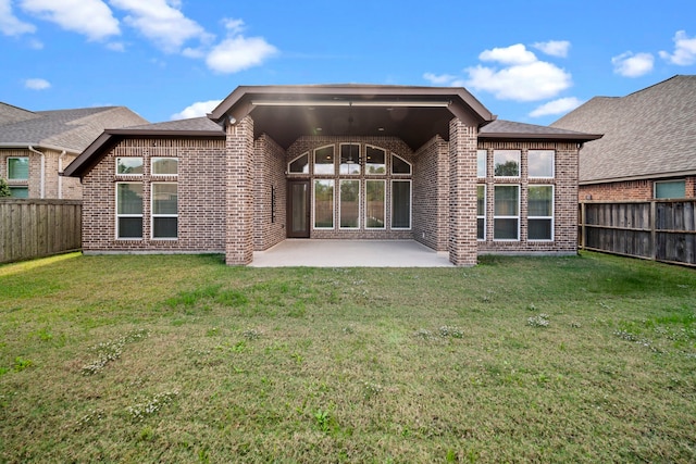 28209 Regal Wood Ct, Spring, TX 77386 - back of house featuring brick siding and a patio