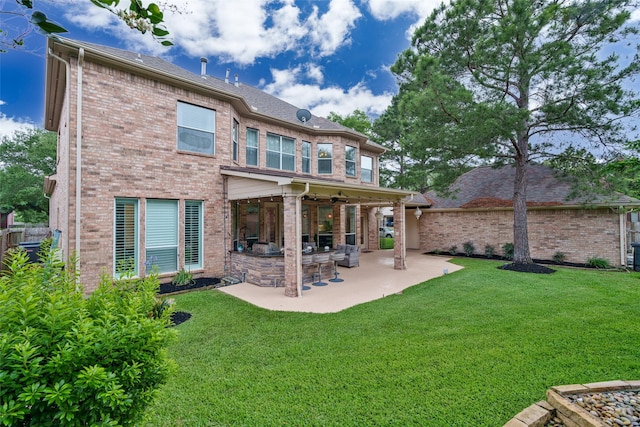 2130 White Eagle Ln, Katy, TX 77450 - back of property with brick siding and a patio