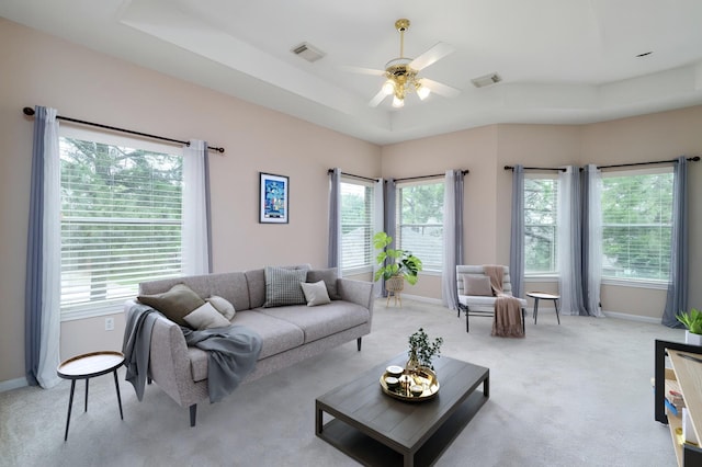 2130 White Eagle Ln, Katy, TX 77450 - living area featuring light colored carpet, a ceiling fan, and baseboards