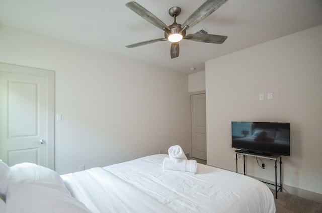 carpeted bedroom with ceiling fan