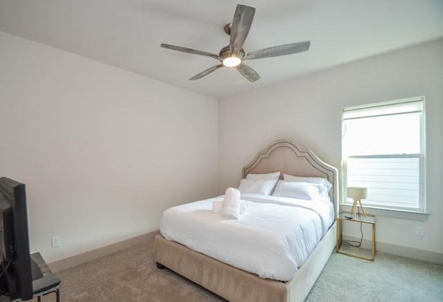 bedroom featuring carpet floors and a ceiling fan