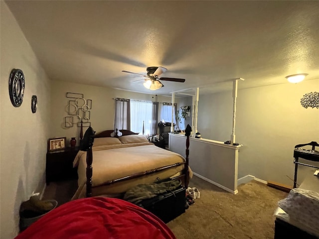 bedroom featuring carpet, baseboards, and a ceiling fan