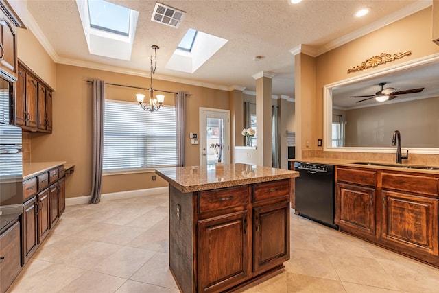 kitchen featuring black dishwasher, a skylight, a sink, light tile patterned floors, and a chandelier
