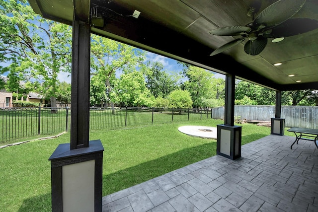 view of patio featuring ceiling fan