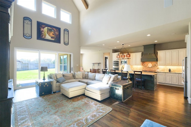 6919 Champion Trl, Katy, TX 77493 - living room with high vaulted ceiling and dark wood finished floors