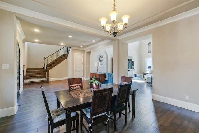 6919 Champion Trl, Katy, TX 77493 - dining room with a chandelier, stairway, baseboards, dark wood finished floors, and recessed lighting
