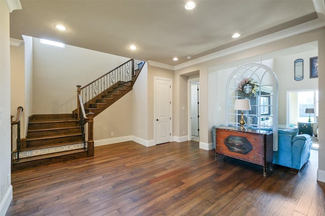 6919 Champion Trl, Katy, TX 77493 - foyer entrance with wood finished floors, stairs, baseboards, recessed lighting, and crown molding
