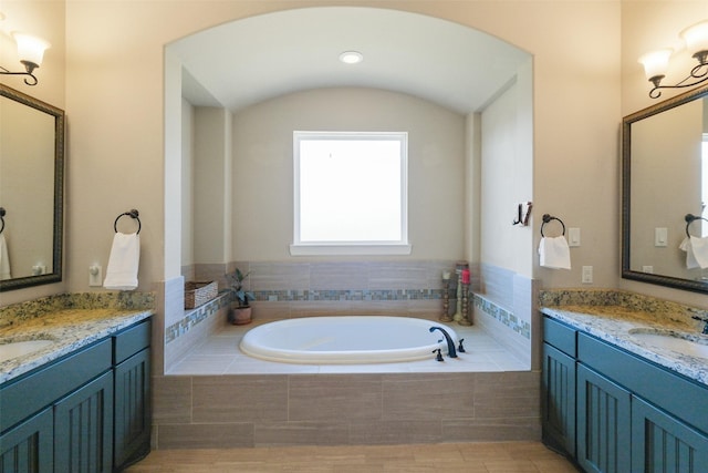 6919 Champion Trl, Katy, TX 77493 - full bath featuring a bath and two vanities