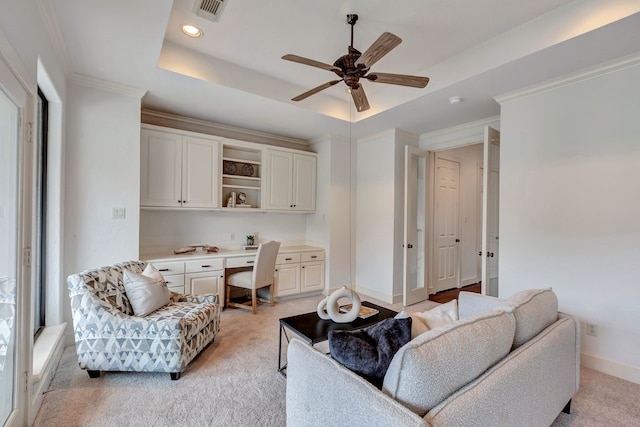 living area with light colored carpet, a ceiling fan, recessed lighting, baseboards, and ornamental molding