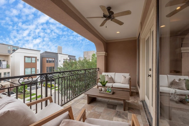balcony featuring a ceiling fan and an outdoor hangout area