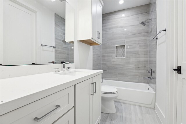 4706 Waring St, Houston, TX 77027 - bathroom with toilet, vanity, shower / bath combination, and recessed lighting