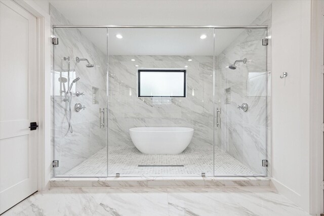 4706 Waring St, Houston, TX 77027 - full bathroom featuring marble look tiles, a marble finish shower, recessed lighting, and baseboards