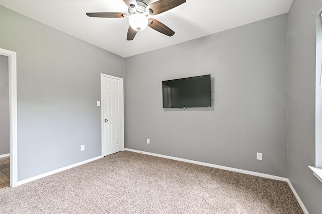 12750 Tullich Ln, Humble, TX 77346 - carpeted spare room with ceiling fan and baseboards