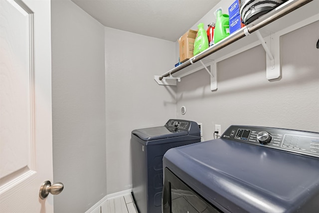 12750 Tullich Ln, Humble, TX 77346 - laundry room featuring washing machine and clothes dryer