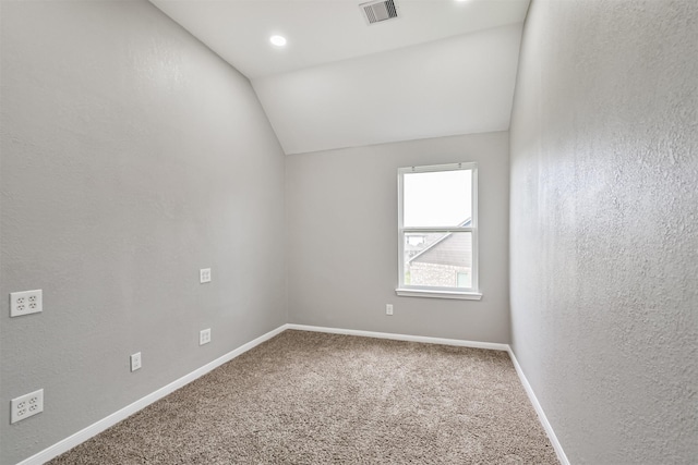 12750 Tullich Ln, Humble, TX 77346 - carpeted empty room featuring lofted ceiling and baseboards