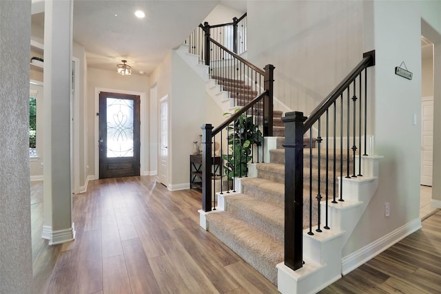 27163 Allenby Park Dr, Magnolia, TX 77354 - entrance foyer with wood finished floors, stairway, baseboards, and recessed lighting
