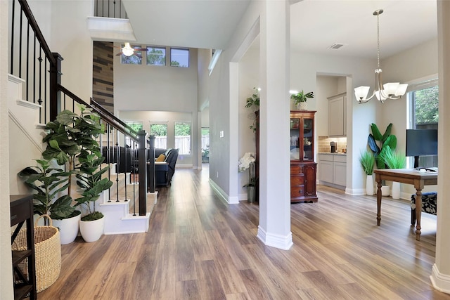 27163 Allenby Park Dr, Magnolia, TX 77354 - foyer entrance with stairway, plenty of natural light, and light wood-type flooring
