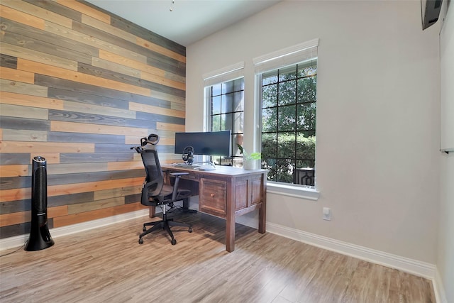 27163 Allenby Park Dr, Magnolia, TX 77354 - home office with wood walls, healthy amount of natural light, wood finished floors, and baseboards