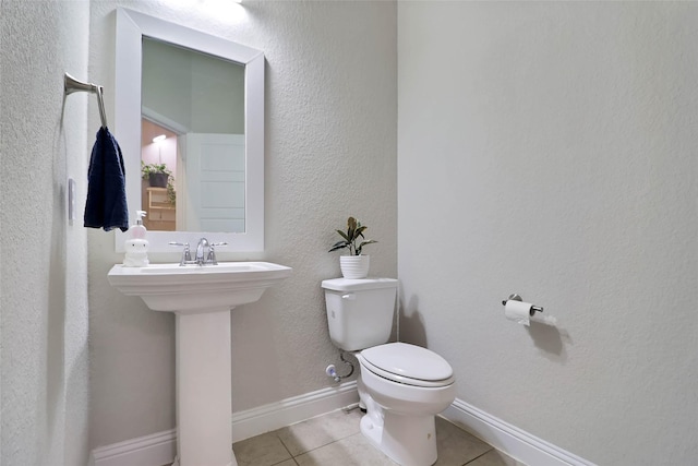 27163 Allenby Park Dr, Magnolia, TX 77354 - half bathroom with tile patterned flooring and toilet