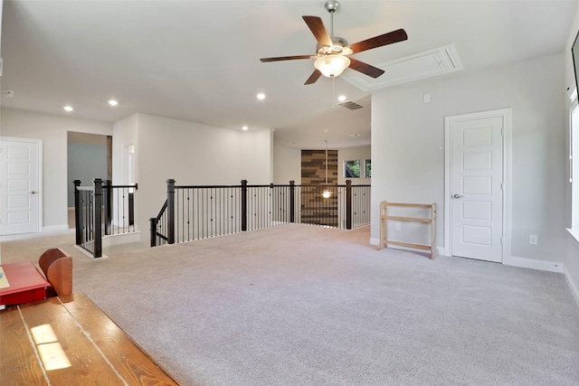 27163 Allenby Park Dr, Magnolia, TX 77354 - unfurnished room with attic access, an upstairs landing, a ceiling fan, carpet, and recessed lighting
