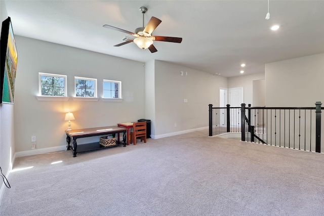 27163 Allenby Park Dr, Magnolia, TX 77354 - sitting room featuring carpet, a ceiling fan, baseboards, recessed lighting, and an upstairs landing