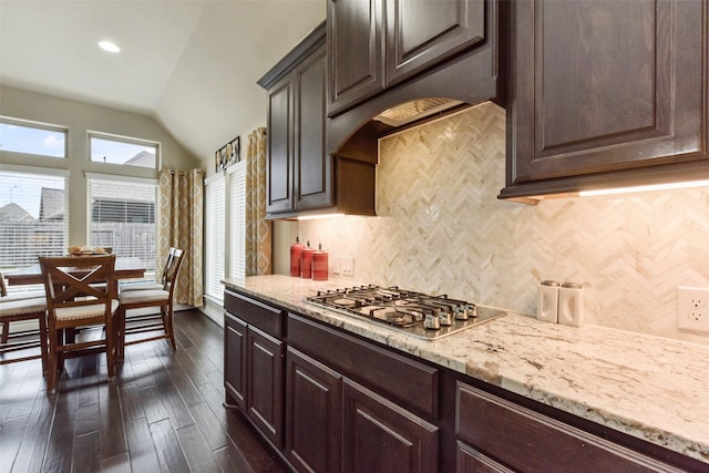 19914 Philippa Hills Trl, Cypress, TX 77433 - kitchen featuring stainless steel gas cooktop, lofted ceiling, decorative backsplash, dark brown cabinets, and recessed lighting