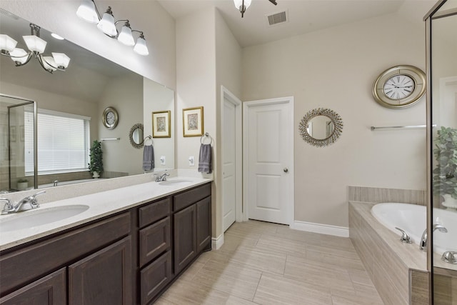 19914 Philippa Hills Trl, Cypress, TX 77433 - full bath with a garden tub, double vanity, tile patterned floors, baseboards, and a shower with door