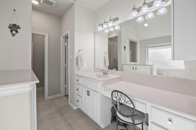 17214 Sequoia Kings Dr, Humble, TX 77346 - full bathroom with a stall shower, tile patterned floors, vanity, and baseboards