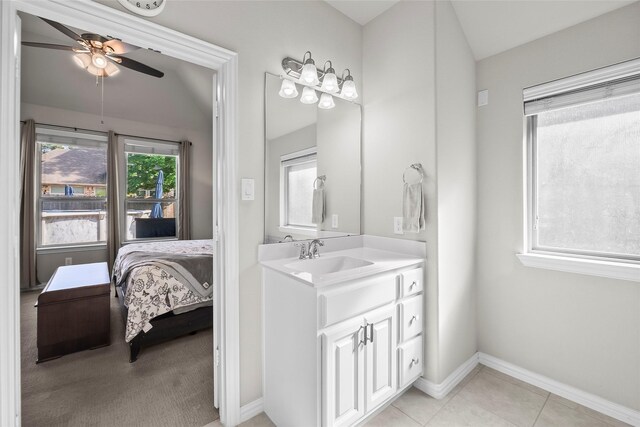 17214 Sequoia Kings Dr, Humble, TX 77346 - ensuite bathroom with a ceiling fan, vanity, and baseboards