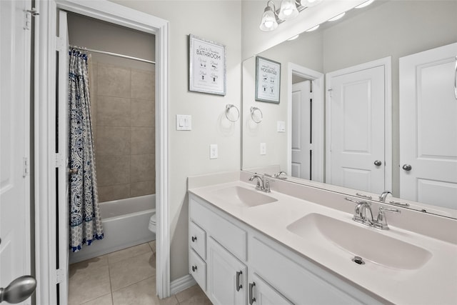 17214 Sequoia Kings Dr, Humble, TX 77346 - full bath featuring tile patterned floors, double vanity, toilet, shower / bath combination with curtain, and baseboards