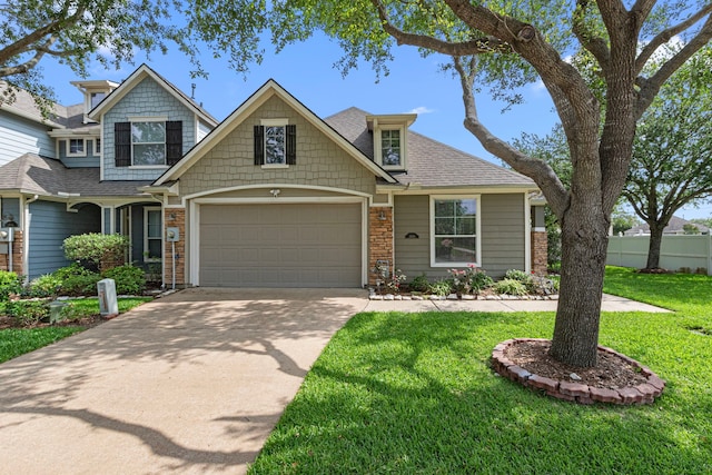 view of front facade with concrete driveway, an attached garage, and a shingled roof