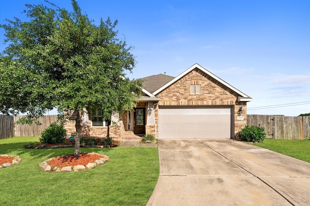 2043 Plum Rose Ln, Richmond, TX 77469 - view of front of property with brick siding, an attached garage, and concrete driveway